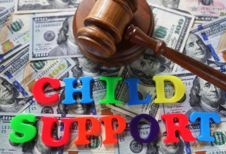 Child support attorney reviewing financial documents in Nassau County