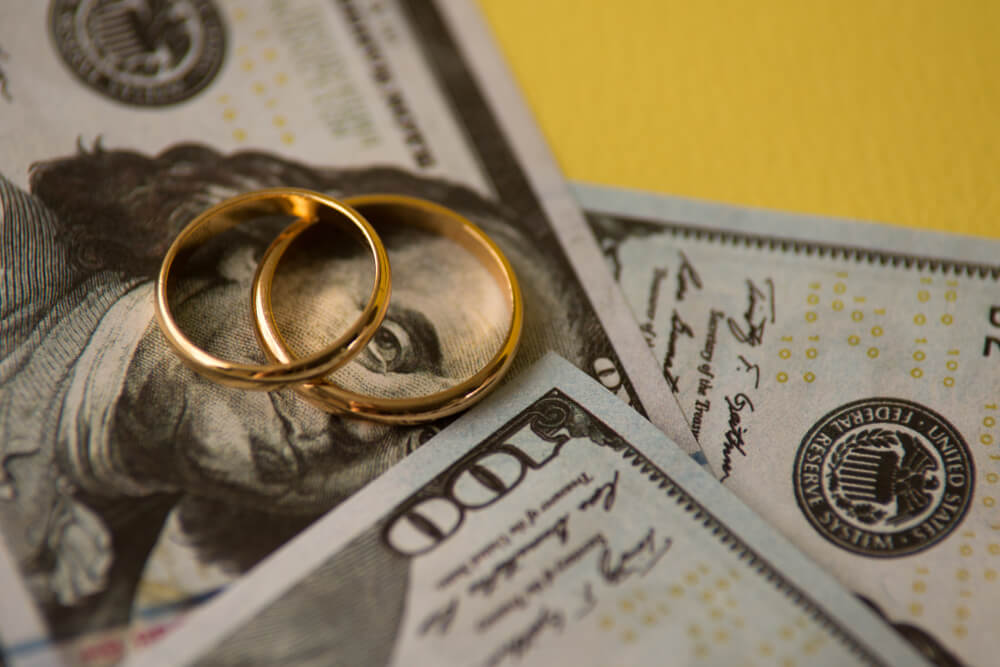 Divorce attorneys at Solomos & Associates PLLC discussing a Nassau County case